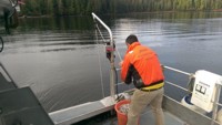 NOAA Ship Fairweather Survey Launch lowering mapping sensors with the Power Hauler